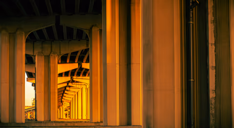 a building with columns and a clock