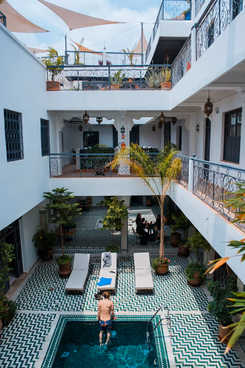 the courtyard pool seen from the gallery above