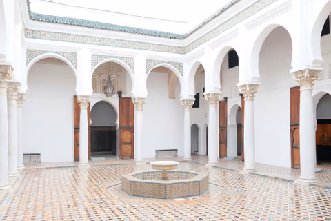 courtyard with tilework and arched colonnades