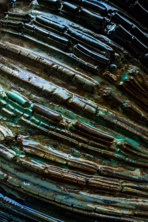 textured layered material with green accents
