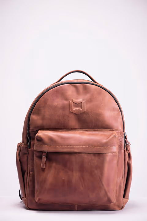 tan leather backpack, front view