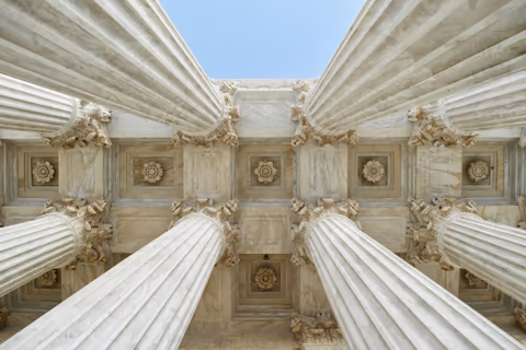 gray stone columns worm's-eye view