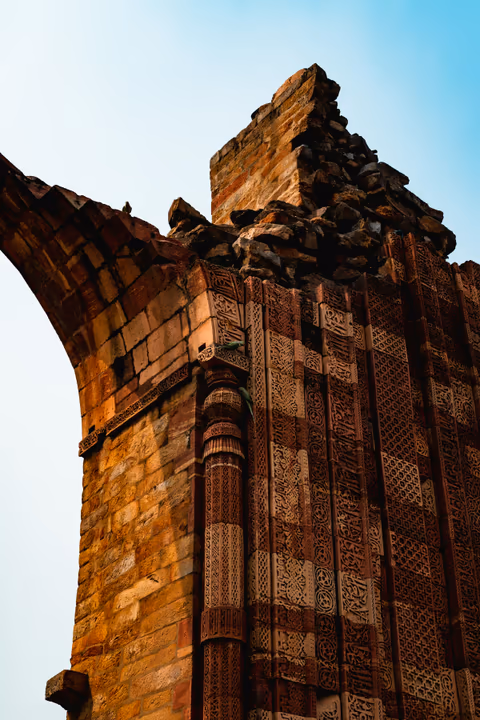 ancient red sandstone archway ruins