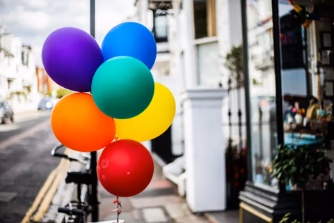 blue yellow red and pink balloons