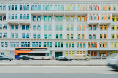 a white building with multicolored windows