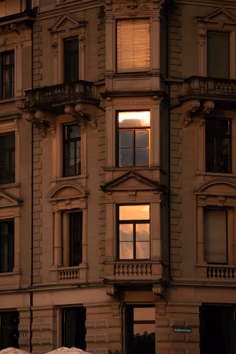 historic facade with golden light in the windows